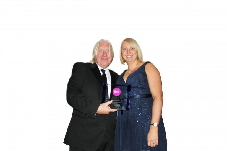 Kevin O'Donnell from Xerox presents Ellie Roberts from PMG with their award.
