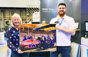 Gillian Fraser and Dan Lathall of Brett Martin with a Roland DG printed sample A banger of a birthday