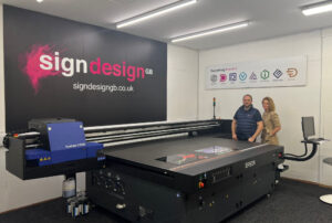 Ben Kennedy, Commercial Director, and Lyndsay Wind, Operations Director, with the Epson SureColor SC-V7000. 