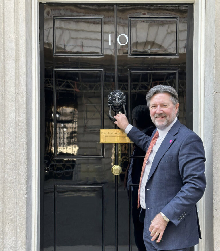 Charles Rogers Knocking at Number 10 Downing Street IPIA Chair