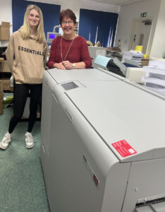 Morgana BM4035 with (left to right) Erin Webb, Print Finisher and Mandy Basterfield, Accounts and General All Rounder.