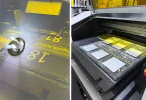 versastudio bd 12 desktop uv flatbed printer alongside a versaobject mo 240 uv flatbed printer