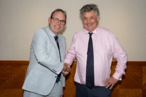 stuart murphy (left hands over the picon chairmanship to tim klemz
